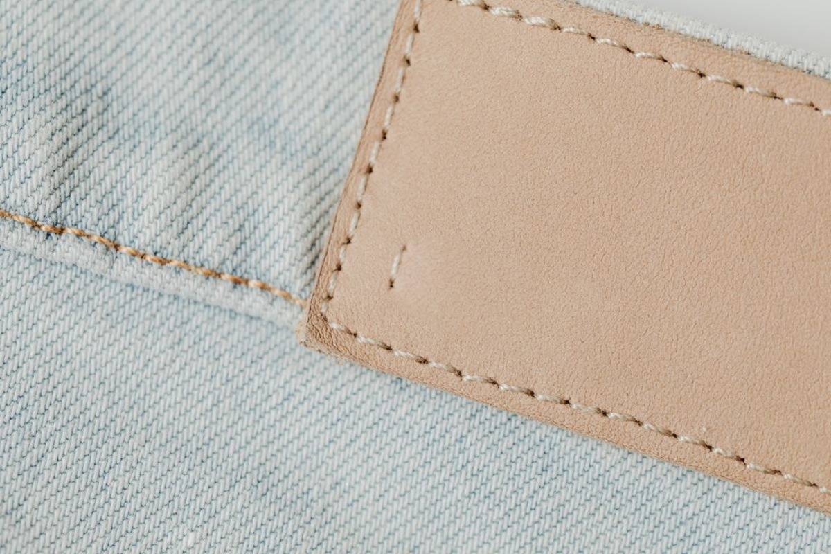 Leather or jacron back patch on denim