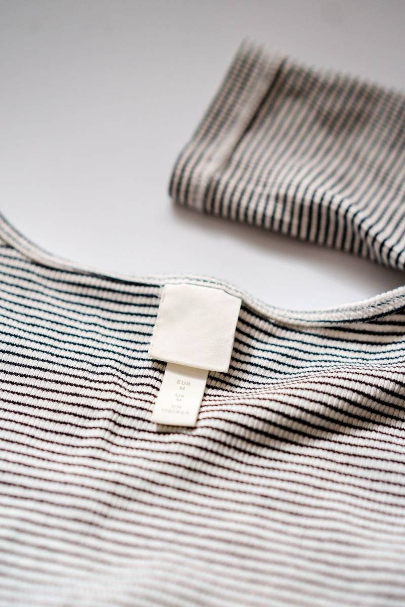 Woven collar label on a polo